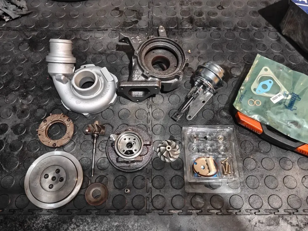 A turbocharger stripped into its components
